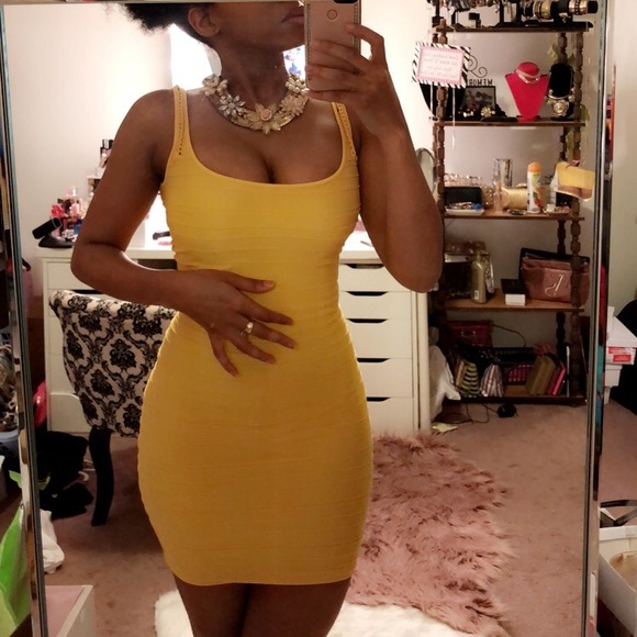 bebe Dresses & Skirts - yellow bebe cut out shine bodycon dress
